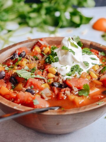 Taco Soup Recipe to warm your soul and your whole body. Perfectly balanced flavors, like a taco in a bowl! Enjoy with tortilla chips and cold weather.