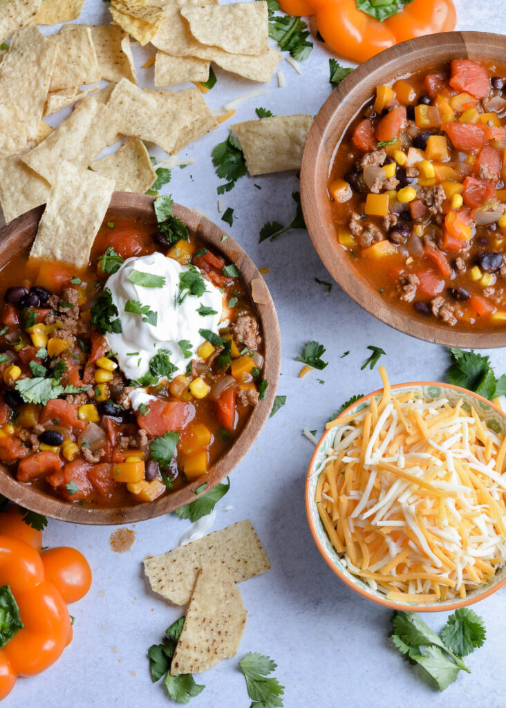 Taco Soup Recipe to warm your soul and your whole body. Perfectly balanced flavors, like a taco in a bowl! Enjoy with tortilla chips and cold weather. 