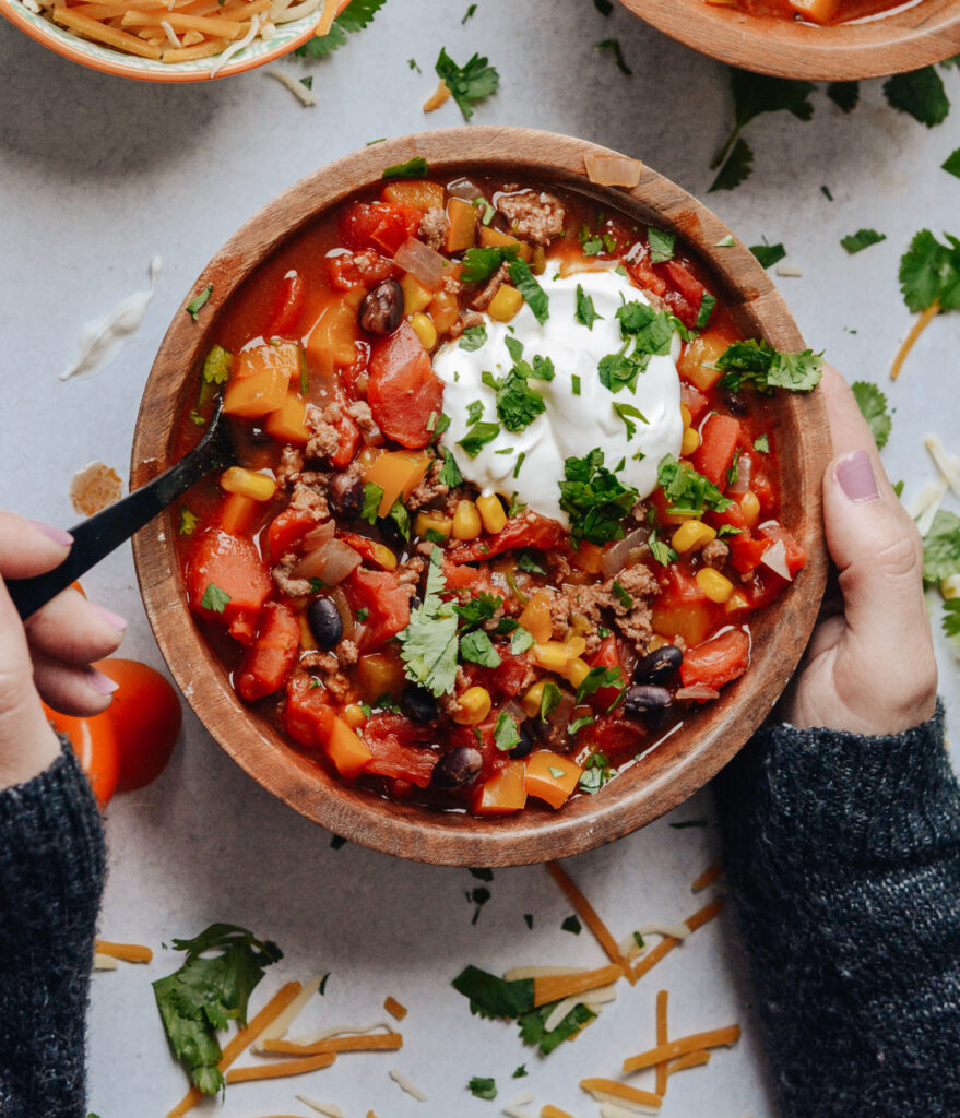 Taco Soup Recipe to warm your soul and your whole body. Perfectly balanced flavors, like a taco in a bowl! Enjoy with tortilla chips and cold weather. 