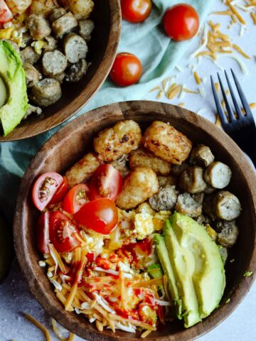 Simple Breakfast Hash—Perfect brunch hash, scrambled eggs, tater tots, cheese, avocado, sausage and toppings.