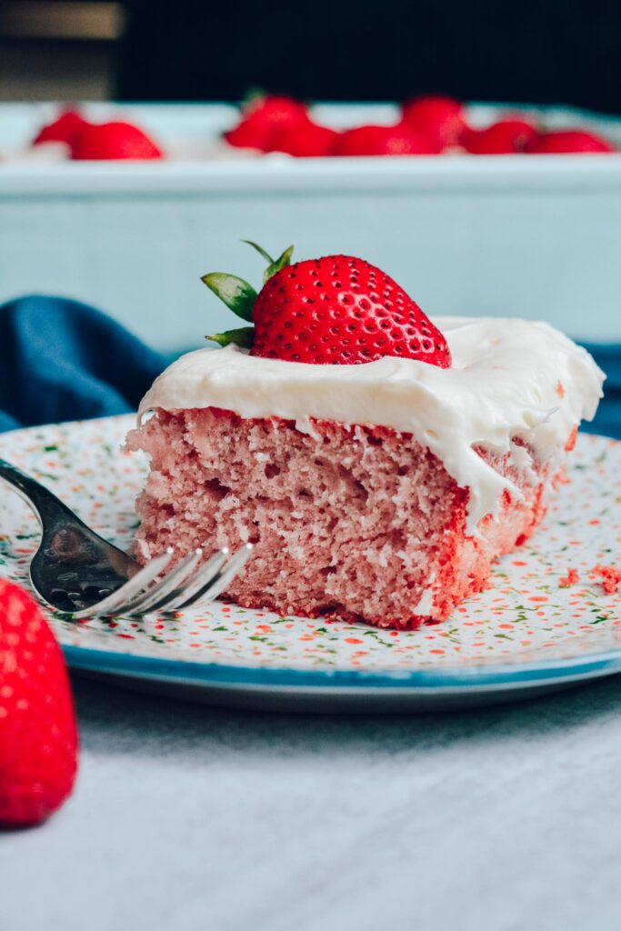 Gluten Free Strawberry Cake - Light, sweet and fluffy cake topped with cream cheese buttercream frosting. Perfect for summer holidays.