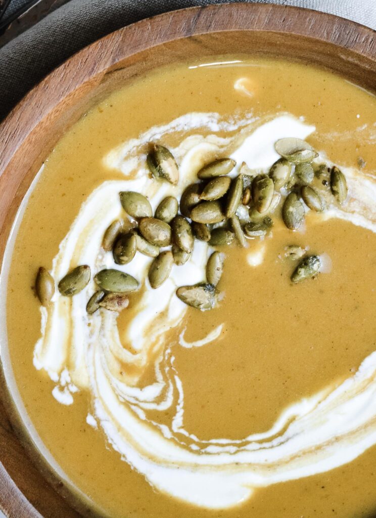 Sweet Potato Pumpkin Soup comes together in 20 minutes, using canned pumpkin. Simple and delicious soup recipe for fall!