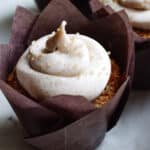 up close cinnamon cupcake in wrapper.