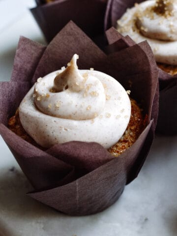 up close cinnamon cupcake in wrapper.