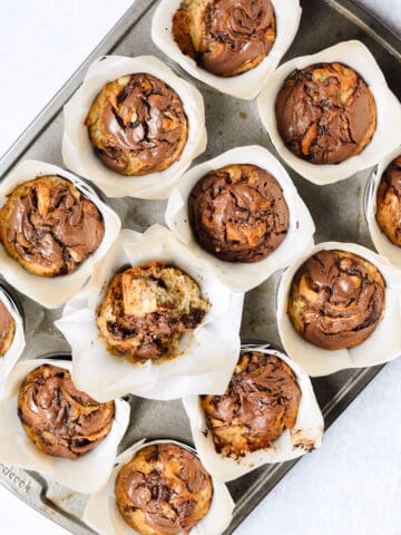 Nutella banana muffins in muffin tin.