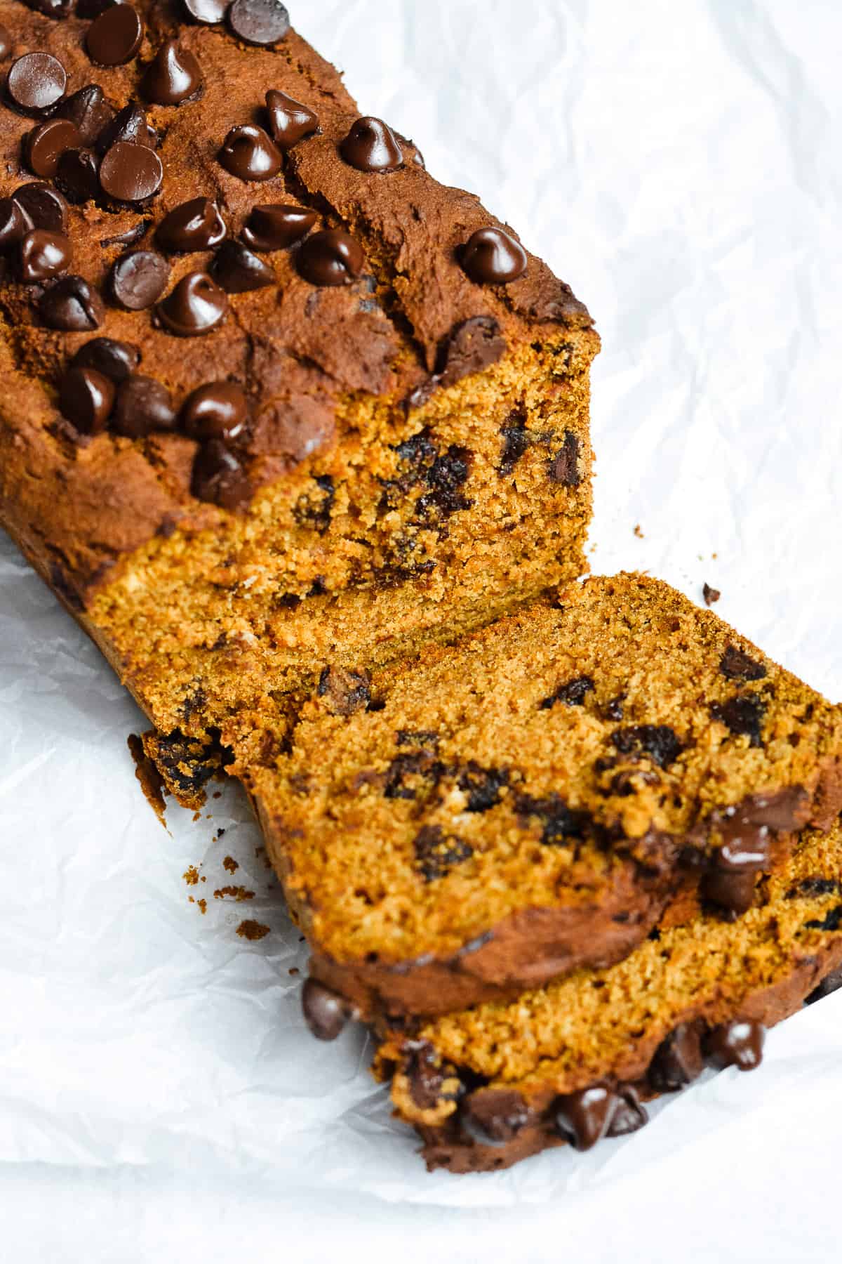 Pumpkin bread with chocolate chips and slices.
